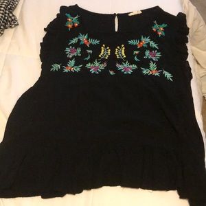 Embroidered peplum top